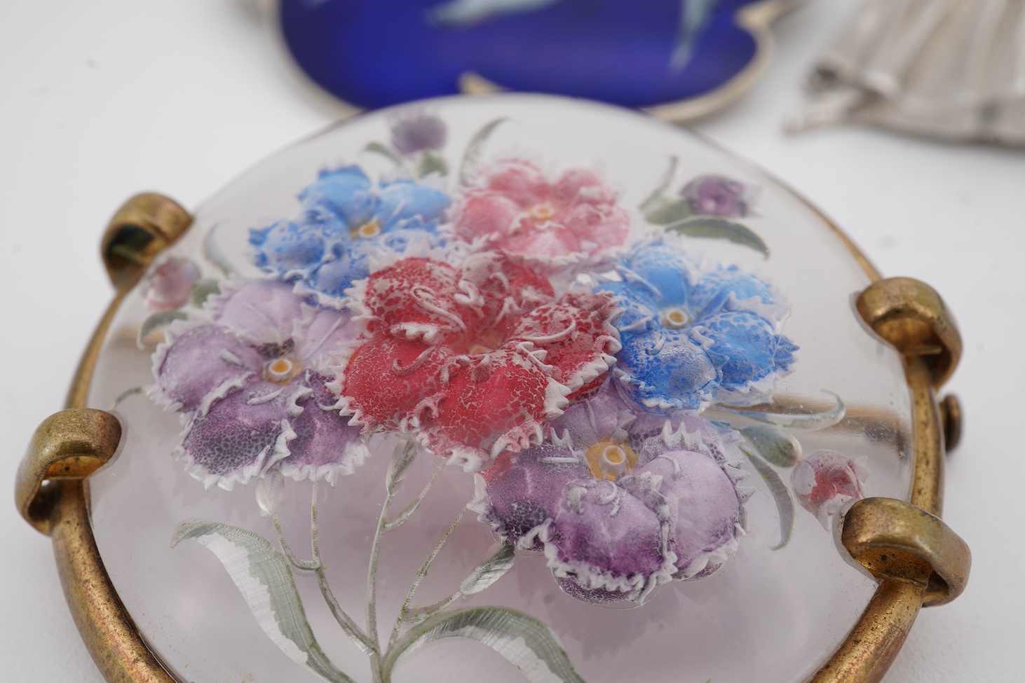 An early to mid 20th century Norwegian 925S and two colour enamelled, brooch, by Ole Nicolai Olberg, depicting three seagulls, 51mm, together with a silver ballerina brooch by D H Phillips Ltd, Birmingham, 1947, a sterli